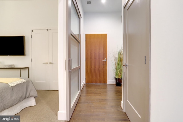 corridor featuring light wood-type flooring