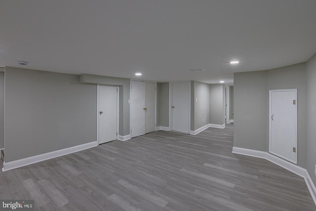 basement featuring light hardwood / wood-style flooring