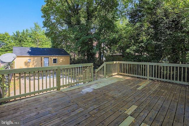 deck featuring an outdoor structure