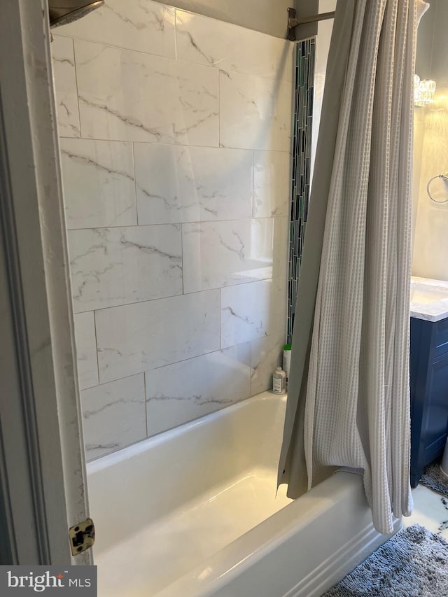 bathroom featuring shower / tub combo with curtain