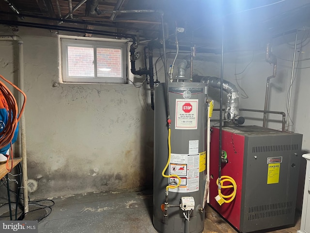 utility room featuring water heater