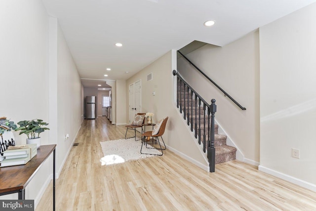 foyer entrance featuring light hardwood / wood-style floors