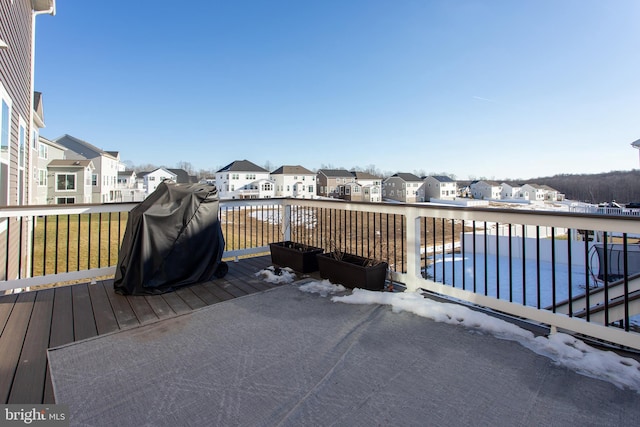 deck with a fenced in pool