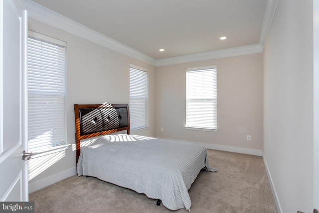 carpeted bedroom with crown molding