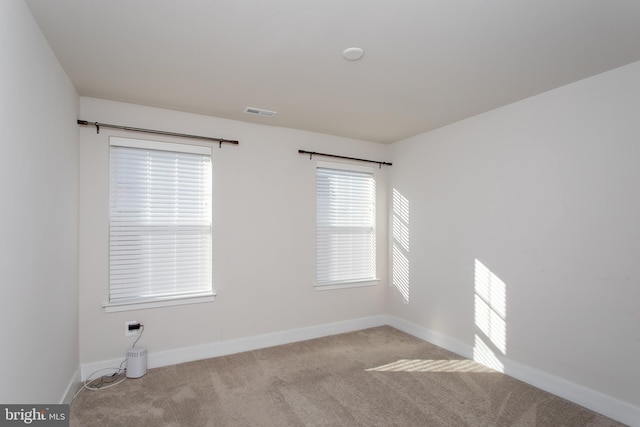 view of carpeted spare room