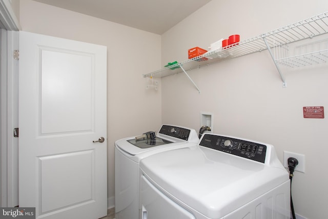 laundry area featuring independent washer and dryer