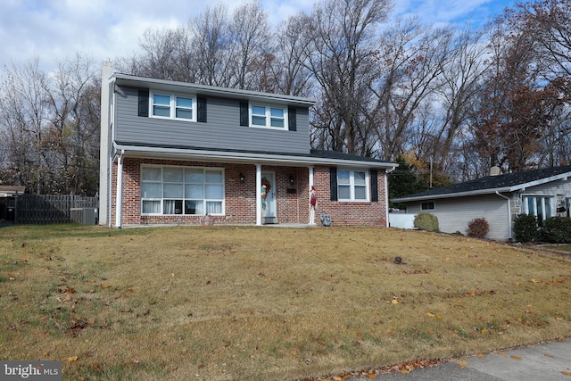 front facade with central air condition unit and a front yard