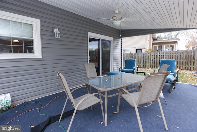 view of patio / terrace featuring ceiling fan