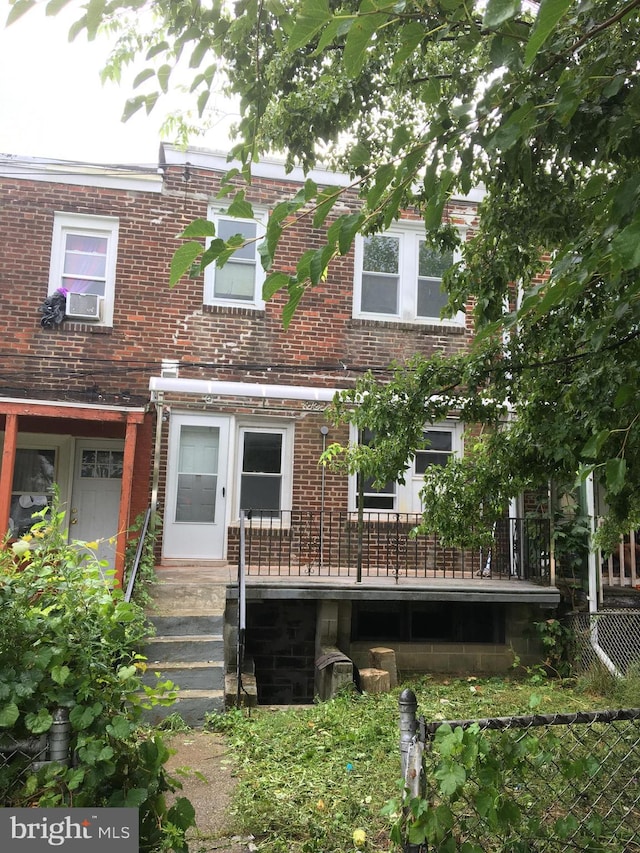 view of front of home featuring cooling unit