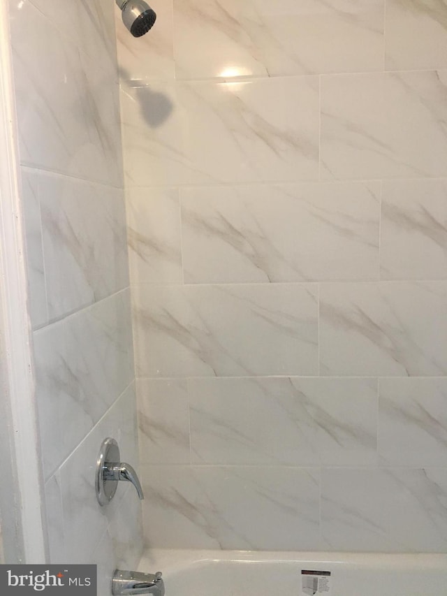 details with tiled shower / bath