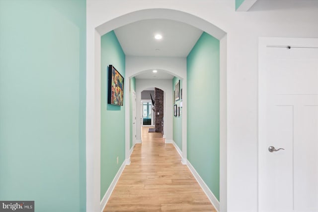 hallway featuring light hardwood / wood-style floors