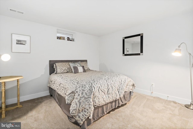 bedroom featuring carpet