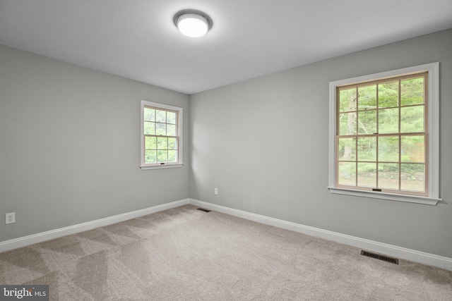 view of carpeted spare room