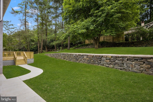 view of yard with a deck