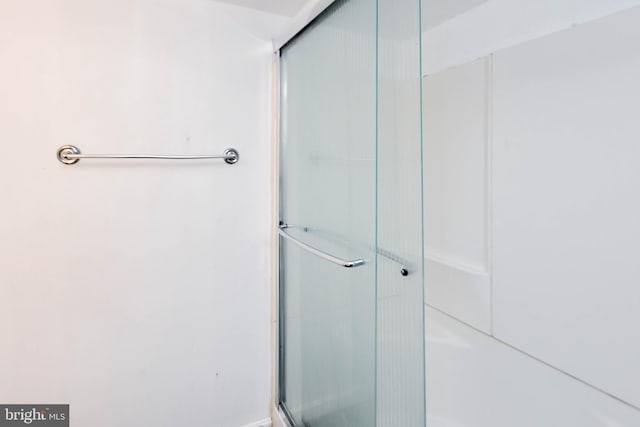 bathroom with walk in shower