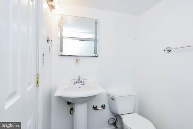 bathroom featuring toilet