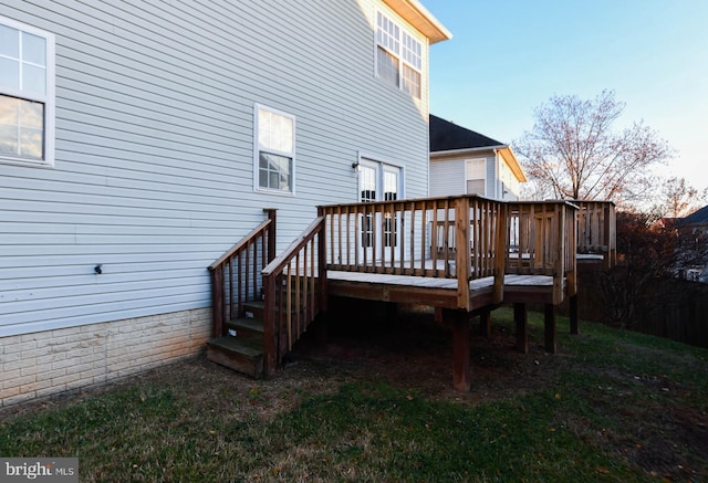 rear view of house with a wooden deck