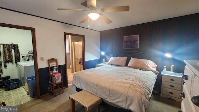 carpeted bedroom with washer and clothes dryer and ceiling fan