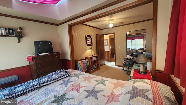 bedroom featuring ceiling fan and ornamental molding