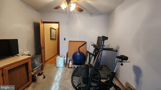 exercise room featuring ceiling fan