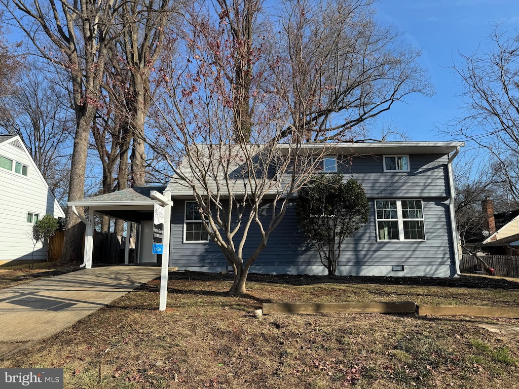 view of front of house featuring a carport