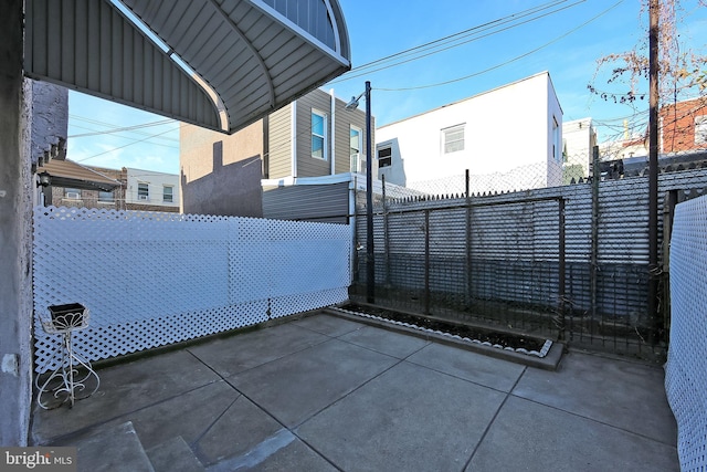 view of patio featuring a carport