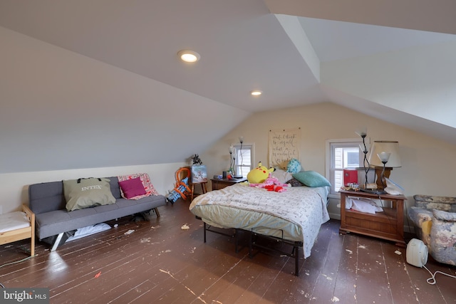 bedroom featuring dark hardwood / wood-style flooring and lofted ceiling