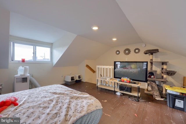 bedroom featuring dark hardwood / wood-style flooring and lofted ceiling