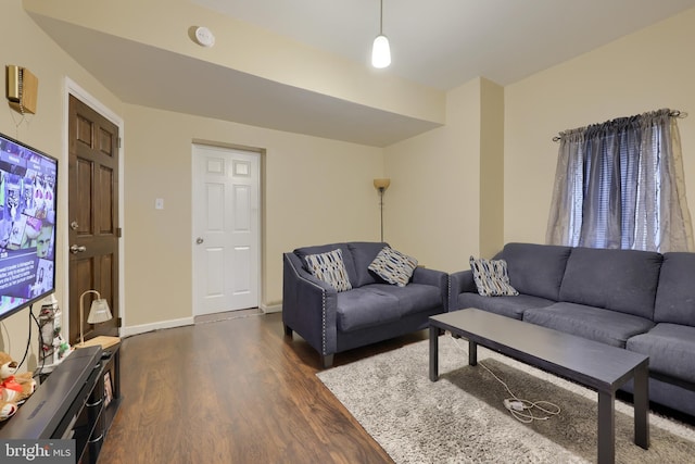 living room featuring dark hardwood / wood-style floors