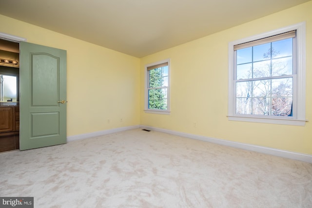 view of carpeted spare room