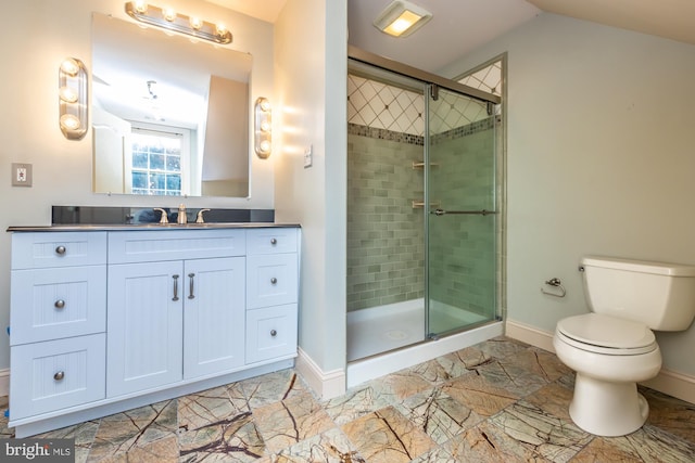 bathroom with vanity, toilet, walk in shower, and lofted ceiling