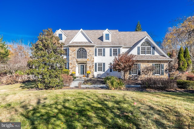 view of front of house with a front lawn