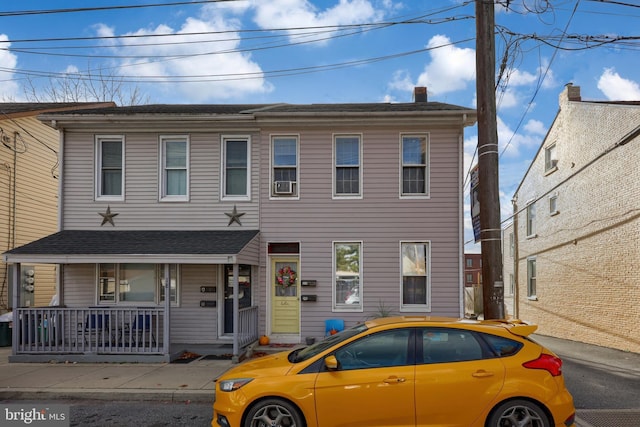 view of front of home featuring covered porch