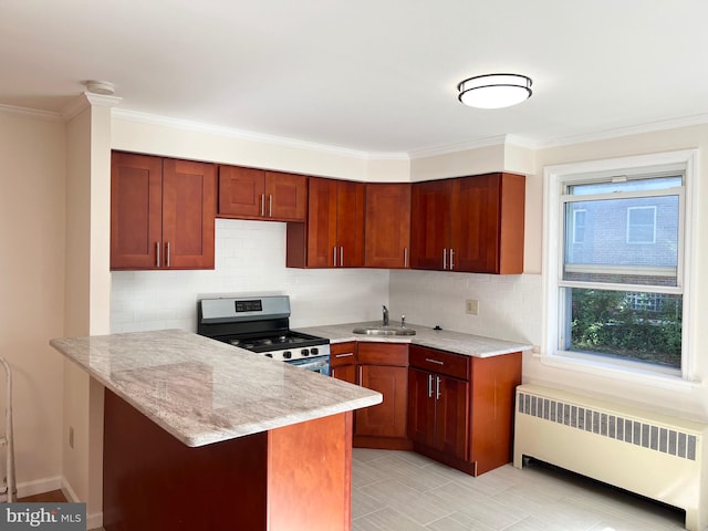 kitchen featuring kitchen peninsula, stainless steel stove, decorative backsplash, light stone counters, and radiator heating unit