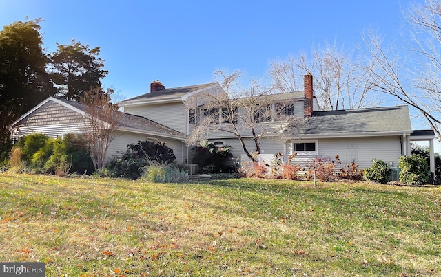 view of side of property featuring a yard