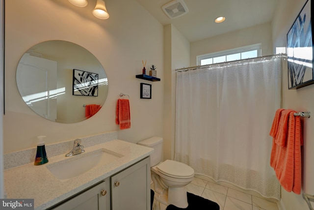 full bathroom with toilet, tile patterned flooring, shower / bathtub combination with curtain, and vanity