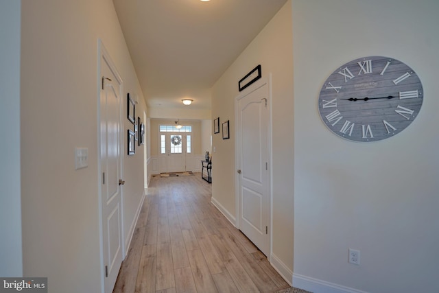 hall featuring light hardwood / wood-style floors