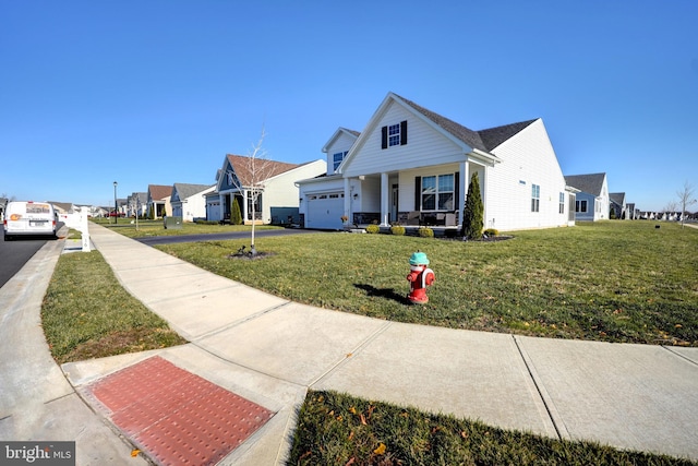 view of front of property with covered porch and a front yard