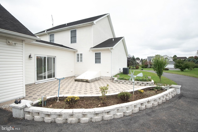 exterior space featuring a patio area and central AC unit