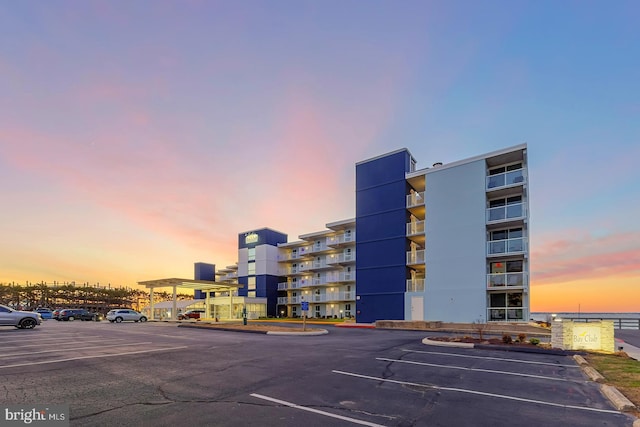 view of outdoor building at dusk