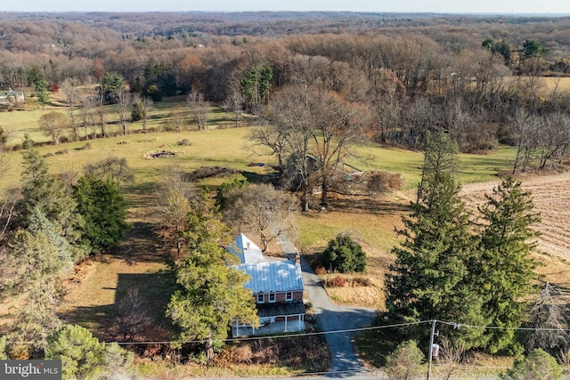 birds eye view of property featuring a rural view