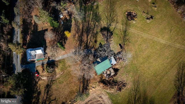 birds eye view of property featuring a rural view