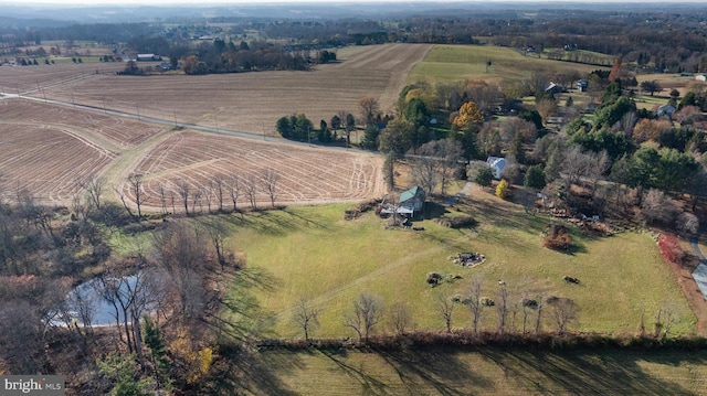 birds eye view of property featuring a rural view