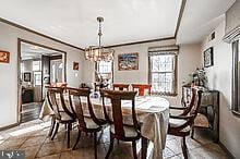 dining space featuring a chandelier