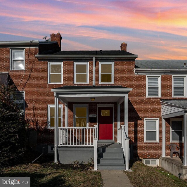 multi unit property featuring covered porch