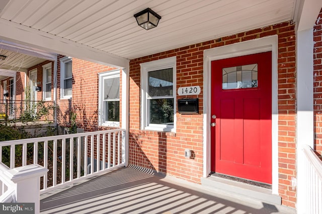 property entrance with a porch