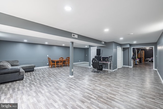 living room with light hardwood / wood-style flooring