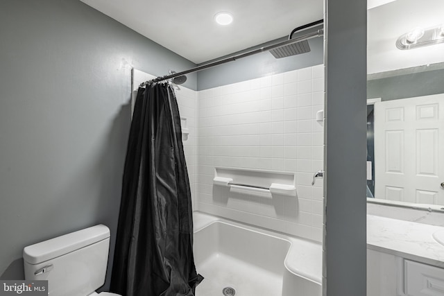 bathroom with vanity, a shower with curtain, and toilet