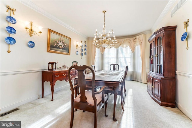 carpeted dining area with a notable chandelier and crown molding