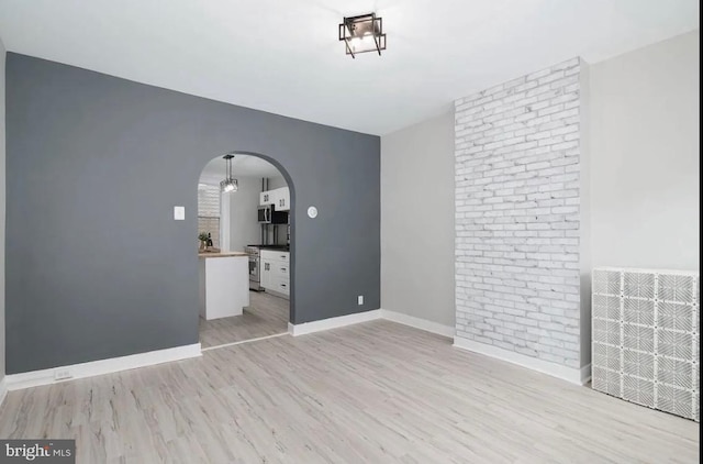 empty room featuring light hardwood / wood-style flooring